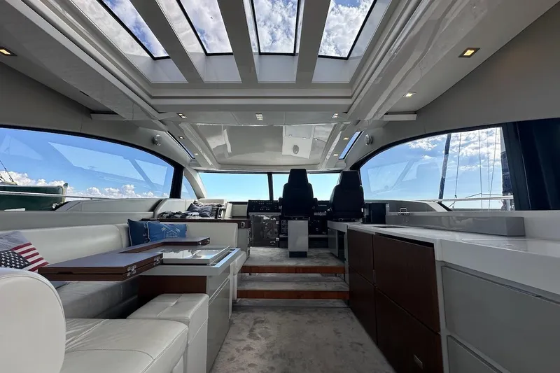 Three Bears Yacht Photos Pics Luxurious interior of 2012 Fairline Targa 58 yacht with panoramic windows and modern design.