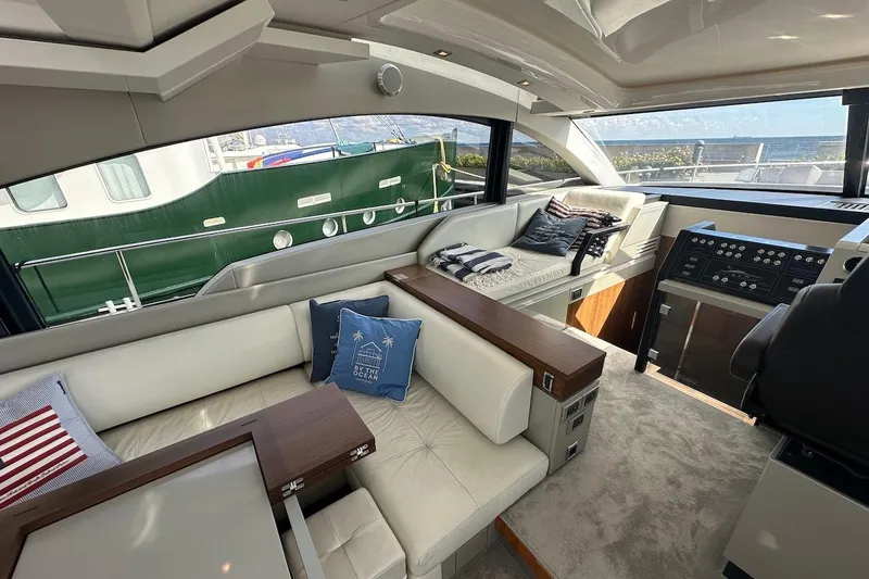 Three Bears Yacht Photos Pics Luxurious interior of 2012 Fairline Targa 58 yacht with plush seating and modern design.