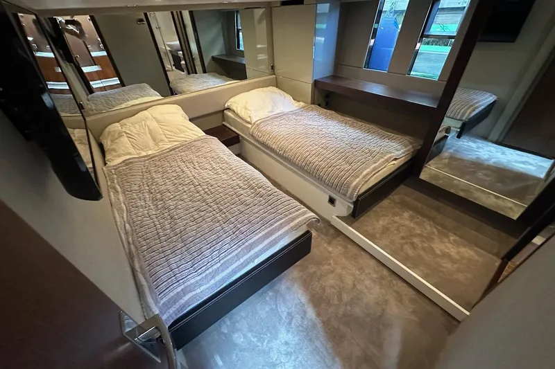 Three Bears Yacht Photos Pics Luxurious twin cabin interior of 2012 Fairline Targa 58 yacht with modern decor.