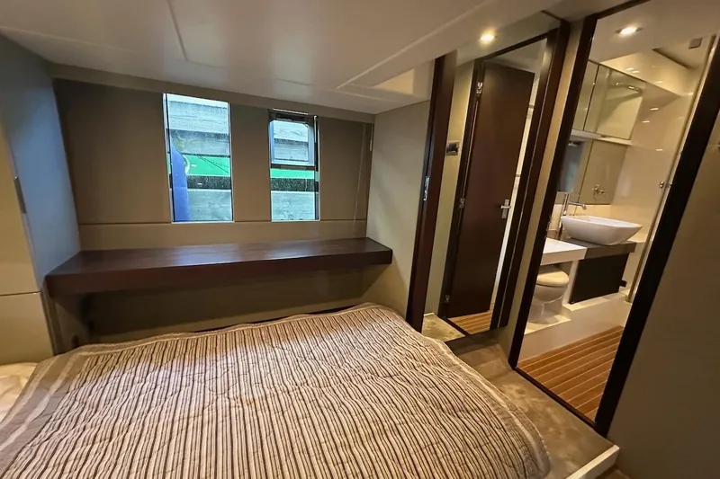 Three Bears Yacht Photos Pics Luxurious 2012 Fairline Targa 58 yacht bedroom with ensuite bathroom and modern design.