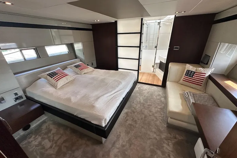 Three Bears Yacht Photos Pics Luxurious 2012 Fairline Targa 58 yacht bedroom with modern decor and ensuite bathroom.