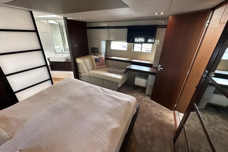 Three Bears Yacht Photos Pics Luxurious 2012 Fairline Targa 58 yacht bedroom with modern decor and ensuite bathroom.