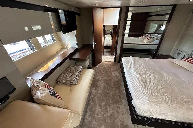 Three Bears Yacht Photos Pics Luxurious interior of 2012 Fairline Targa 58 yacht with modern furnishings and cozy seating.