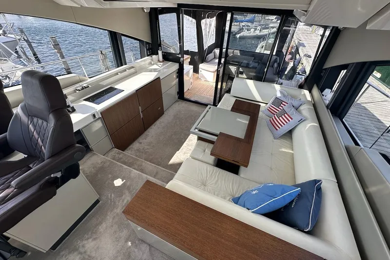Three Bears Yacht Photos Pics Luxurious interior of 2012 Fairline Targa 58 yacht with plush seating and modern design.