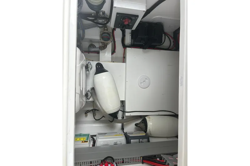  Yacht Photos Pics Engine compartment of 2025 Beneteau Antares 11 Coupe with equipment and wiring.