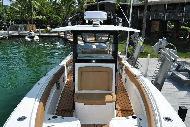  Yacht Photos Pics 2020 Sea Hunt Gamefish 30 boat docked, featuring spacious deck and modern design.