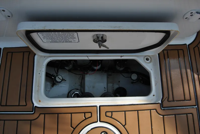  Yacht Photos Pics Open hatch on 2020 Sea Hunt Gamefish 30 boat deck, showing interior components.