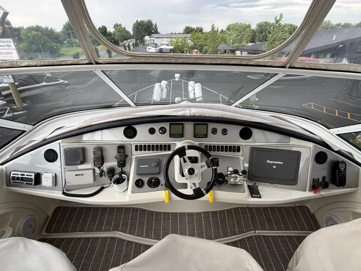 Odyssea II Yacht Photos Pics 2009 Carver 46 Motor Yacht helm with advanced navigation and control systems.