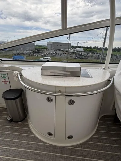 Odyssea II Yacht Photos Pics 2009 Carver 46 Motor Yacht interior with sleek countertop and outdoor view.