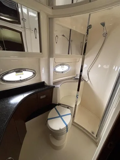 Odyssea II Yacht Photos Pics Bathroom interior of 2009 Carver 46 Motor Yacht with shower and toilet.