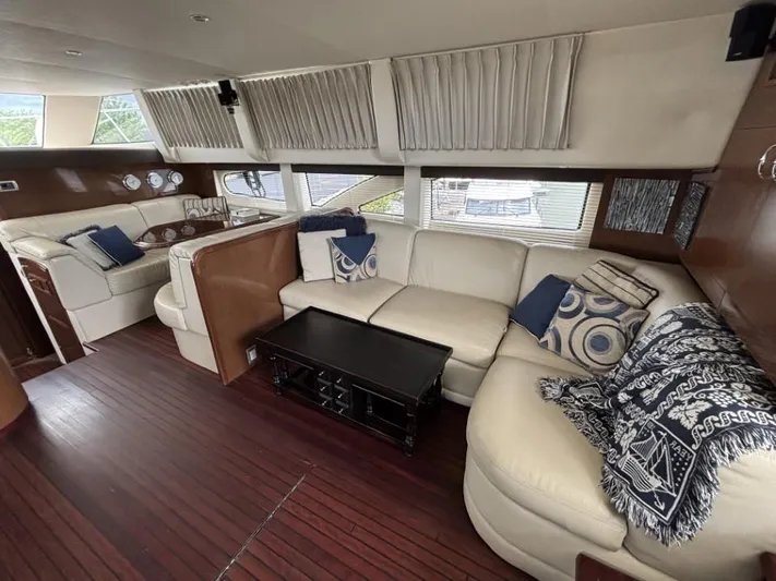 Odyssea II Yacht Photos Pics Luxurious interior of 2009 Carver 46 Motor Yacht with elegant seating and decor.