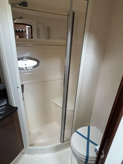 Odyssea II Yacht Photos Pics Bathroom in 2009 Carver 46 Motor Yacht with shower and toilet.