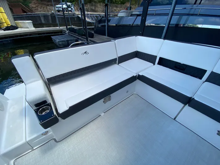  Yacht Photos Pics 2022 Monterey 378SS boat interior with white seating and cup holder.