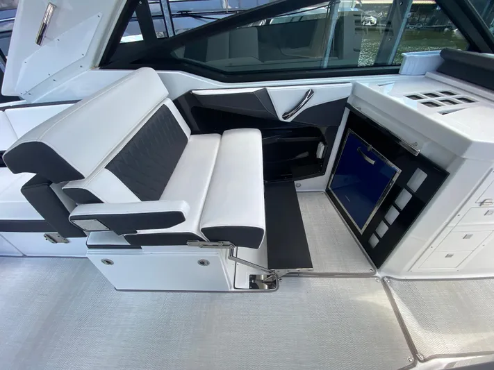  Yacht Photos Pics 2022 Monterey 378SS boat interior with sleek seating and modern design.