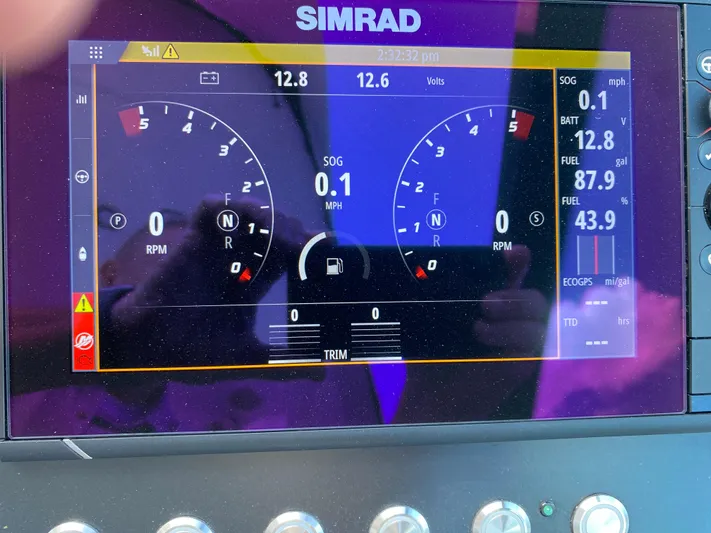  Yacht Photos Pics Simrad display on 2022 Monterey 378SS showing speed, RPM, fuel, and battery voltage.