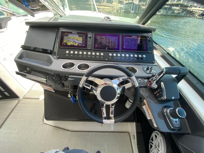  Yacht Photos Pics 2022 Monterey 378SS boat dashboard with advanced navigation and control systems.