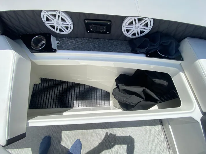  Yacht Photos Pics Interior storage compartment of 2022 Monterey 378SS boat with speakers and cup holders.