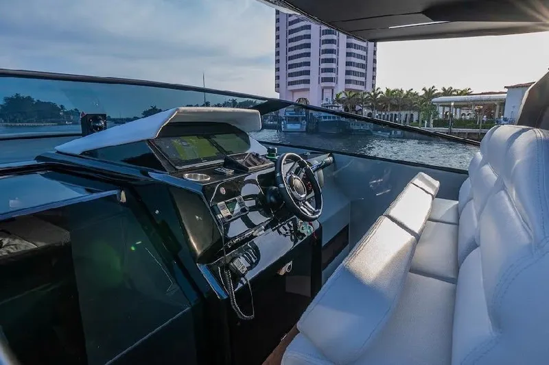  Yacht Photos Pics 2024 Rio Yachts Daytona 50 cockpit with modern steering and luxurious seating.