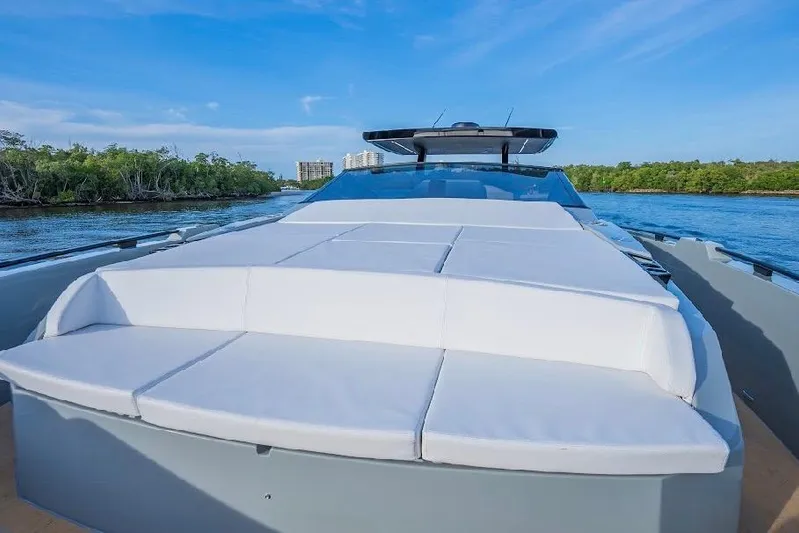  Yacht Photos Pics 2024 Rio Yachts Daytona 50 luxury yacht with spacious sun deck on serene water.