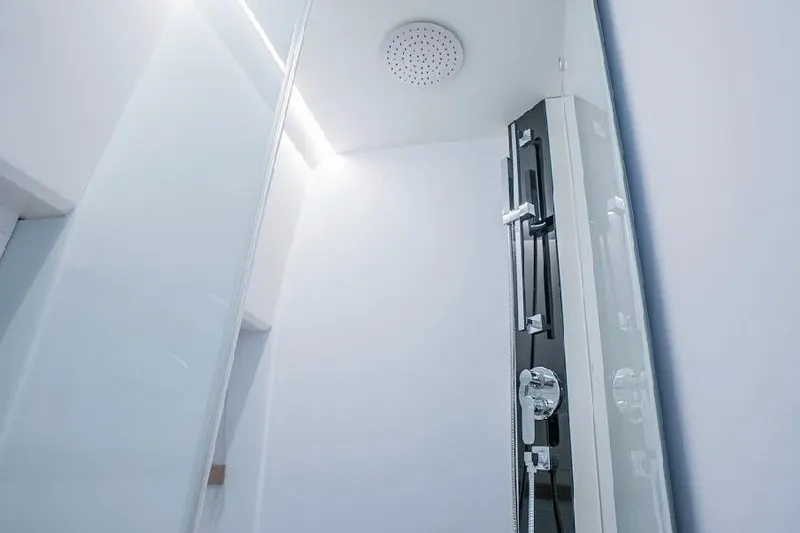  Yacht Photos Pics Modern shower in 2024 Rio Yachts Daytona 50, featuring sleek design and chrome fixtures.