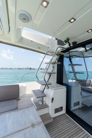 Motivated Seller Yacht Photos Pics Prestige 520 Flybridge 2019 yacht interior with ocean view and modern amenities.