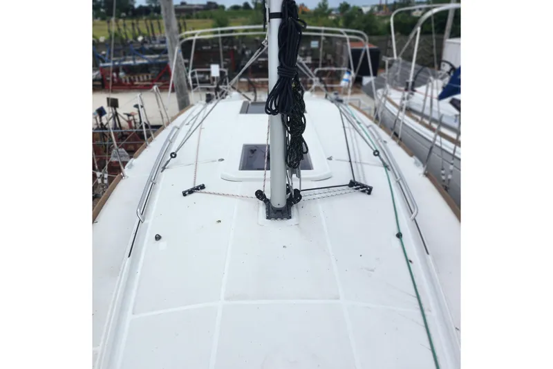  Yacht Photos Pics 2023 Jeanneau Sun Odyssey 349 sailboat deck with rigging and equipment.