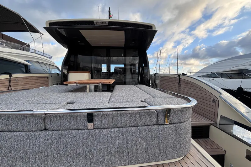  Yacht Photos Pics Luxurious 2026 Invictus ST 550 yacht with spacious deck and elegant design.