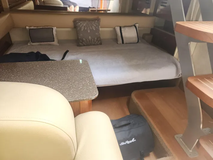  Yacht Photos Pics Interior of 2013 Sea Ray 370 Sundancer with cozy seating and modern decor.