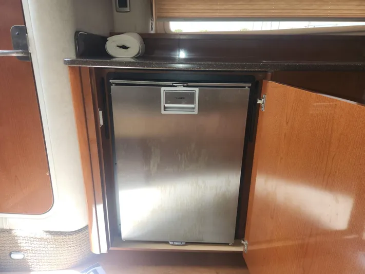  Yacht Photos Pics Stainless steel fridge in 2013 Sea Ray 370 Sundancer yacht interior.