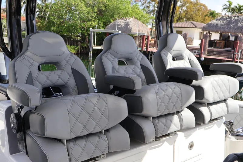  Yacht Photos Pics Luxury seating on 2020 Blackwater 41 Performance Fish boat, featuring gray diamond-stitched upholstery.