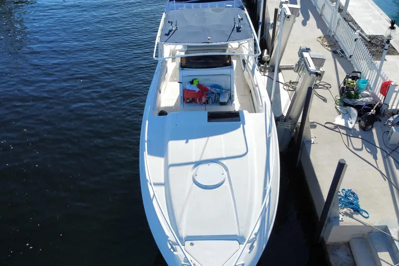  Yacht Photos Pics Aerial view of 2004 Deep Impact 36 DI boat docked at marina.