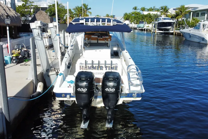  Yacht Photos Pics 2004 Deep Impact 36 DI boat docked with twin 400 horsepower engines.