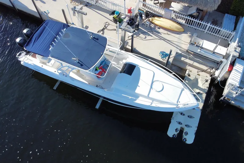  Yacht Photos Pics Aerial view of 2004 Deep Impact 36 DI boat docked at marina.