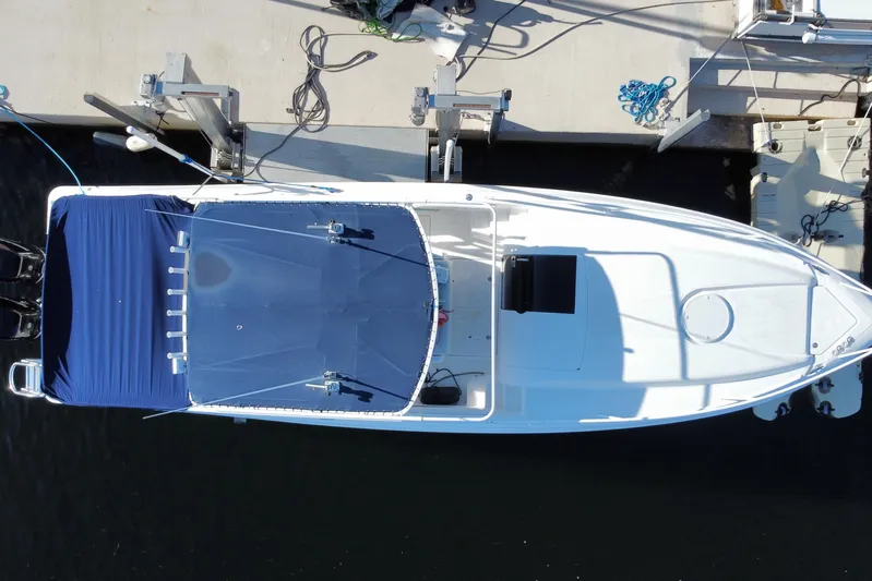  Yacht Photos Pics Overhead view of a 2004 Deep Impact 36 DI boat docked at a marina.