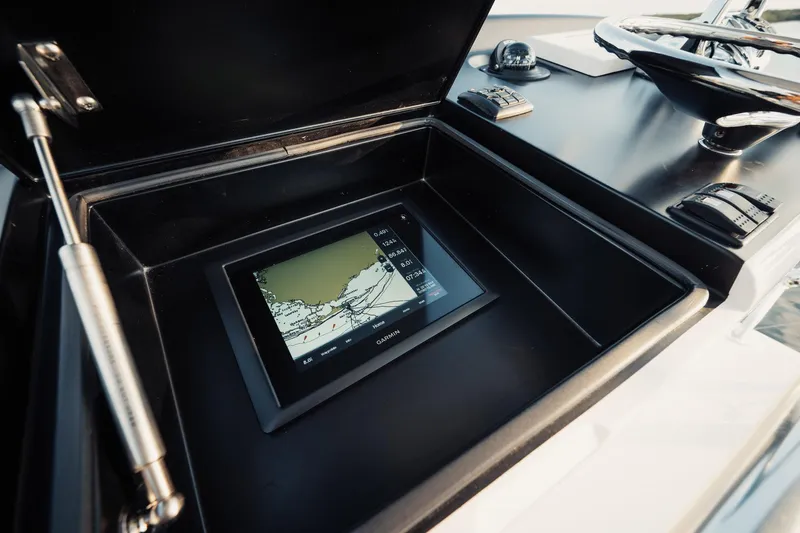 Dog House Yacht Photos Pics Control panel of 2016 F&S Express boat featuring a Garmin navigation system.