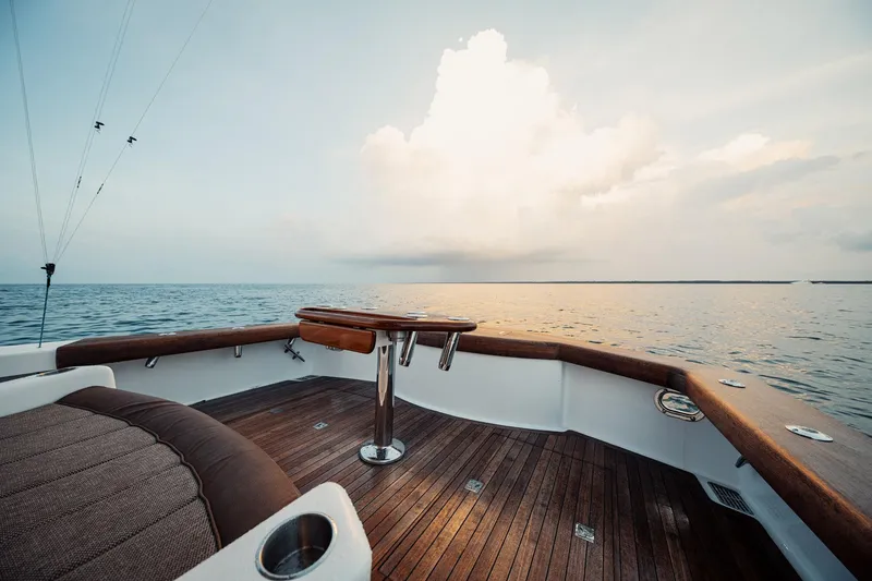 Dog House Yacht Photos Pics Luxurious 2016 F&S Express yacht deck with ocean view at sunset.