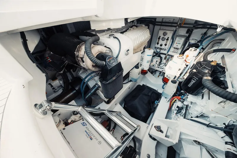 Dog House Yacht Photos Pics Engine room of 2016 F&S Express boat, showcasing mechanical components and systems.