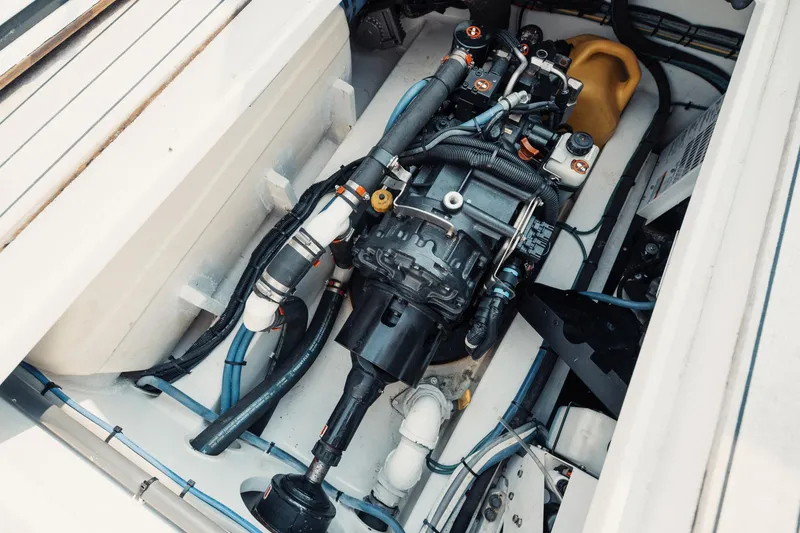 Dog House Yacht Photos Pics Engine compartment of a 2016 F&S Express boat, showcasing detailed mechanical components.