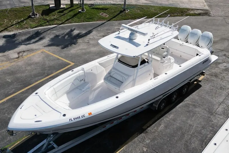  Yacht Photos Pics 2022 Intrepid 345 Nomad FE boat on trailer, aerial view.