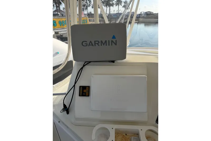 Unbelievable Yacht Photos Pics Garmin navigation system on 1984 Bertram 42 Convertible boat dashboard.