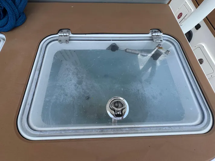  Yacht Photos Pics Livewell on 2019 World Cat 3200 boat with transparent lid and latch.