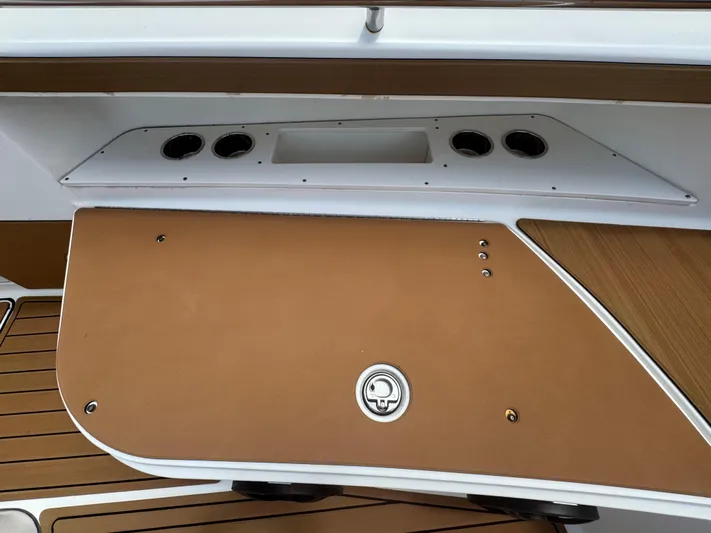  Yacht Photos Pics 2019 World Cat 3200 boat interior with tan and white paneling.