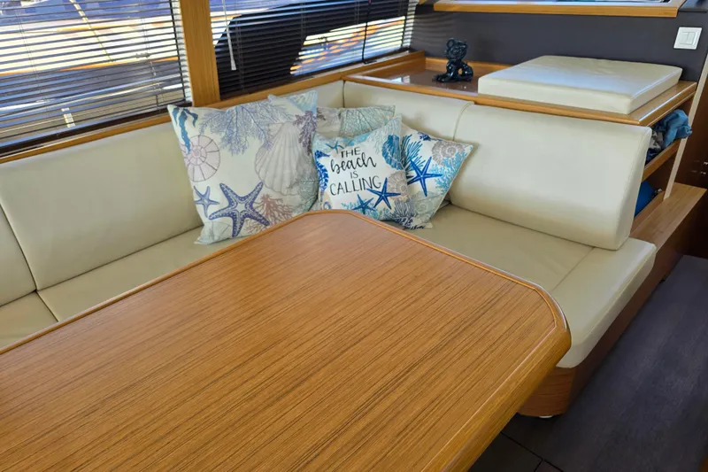  Yacht Photos Pics Interior of 2020 Greenline 40 yacht with cozy seating and decorative pillows.