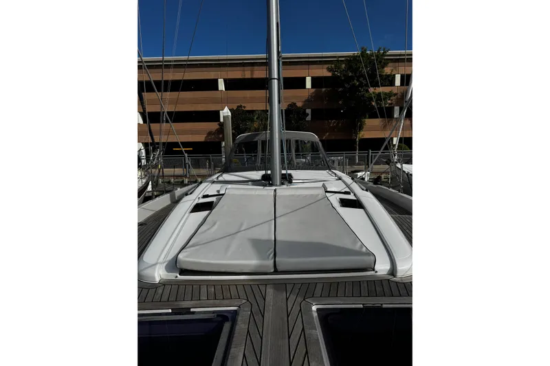 Sea Dawgs Yacht Photos Pics 2021 Beneteau Oceanis Yacht 54 deck view with sleek design and modern features.