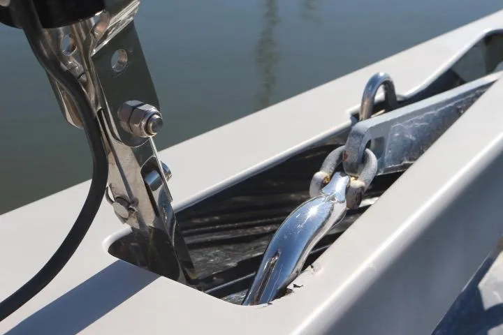 Sea Dawgs Yacht Photos Pics Anchor chain detail on 2021 Beneteau Oceanis Yacht 54, showcasing stainless steel fittings.