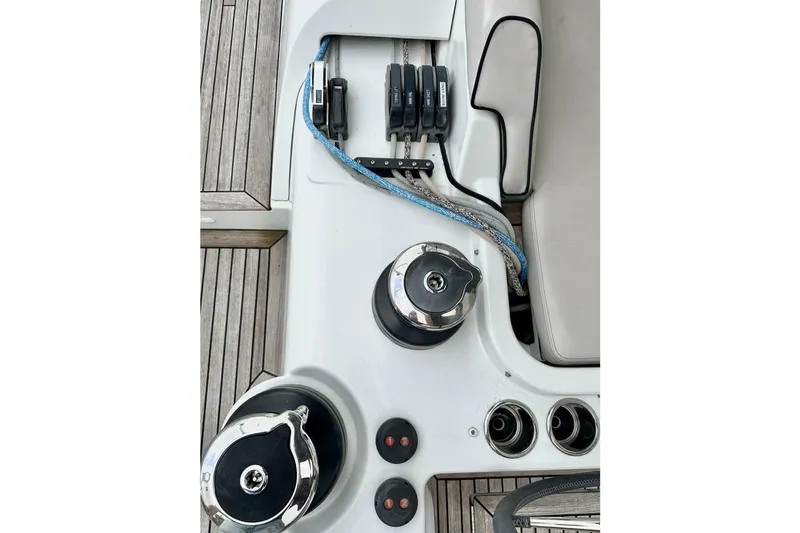 Sea Dawgs Yacht Photos Pics Beneteau Oceanis Yacht 54 deck controls, featuring winches and rope clutches, 2021 model.