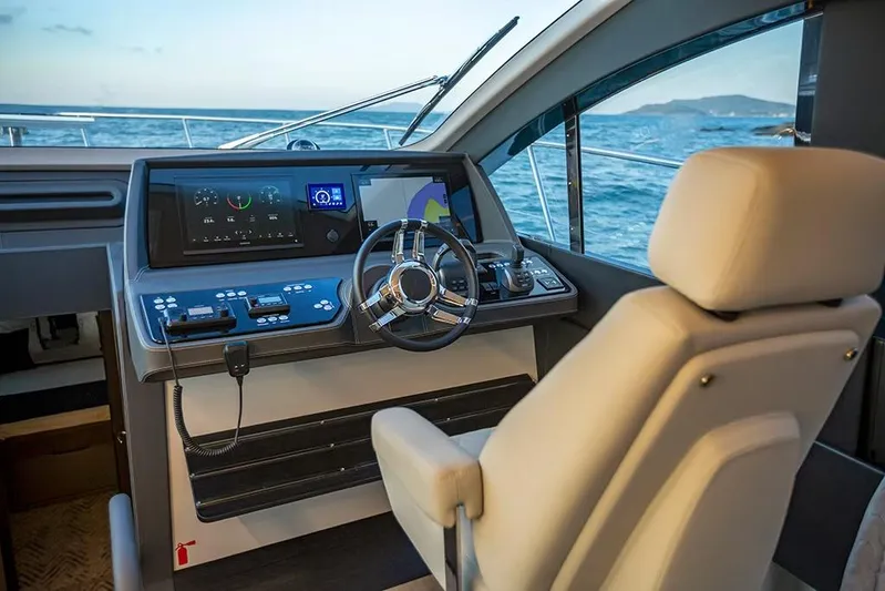  Yacht Photos Pics Manufacturer Provided Image: Luxury yacht cockpit of 2025 Schaefer 600 with modern navigation controls.