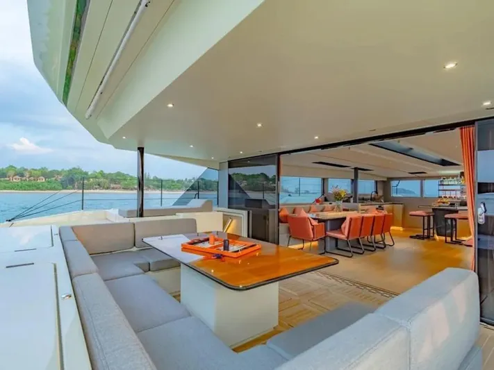 Jack Yacht Photos Pics Luxurious 2023 McConaghy MC75 yacht interior with spacious seating and dining area.