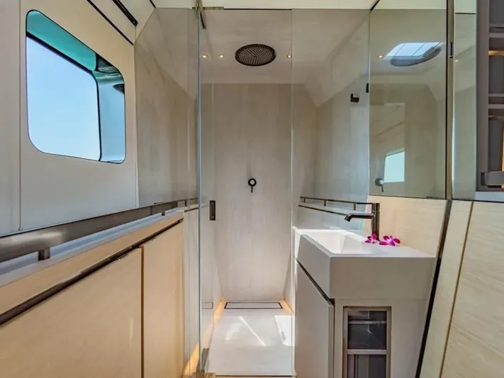 Jack Yacht Photos Pics Luxurious bathroom in 2023 McConaghy MC75 yacht with modern shower and sleek design.