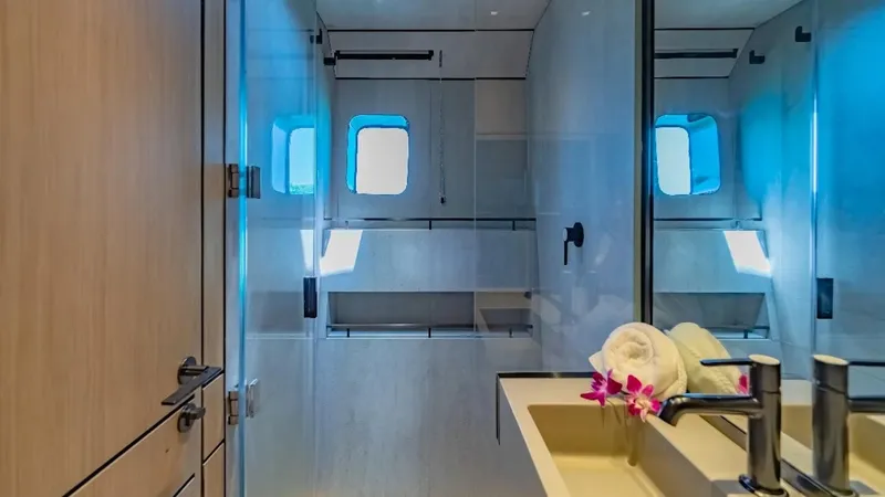 Jack Yacht Photos Pics Luxurious bathroom in 2023 McConaghy MC75 yacht with modern fixtures and elegant design.